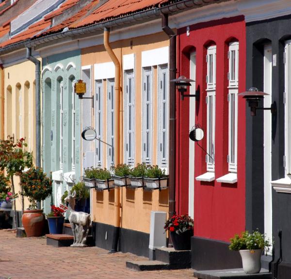 Colourful houses line a street in Fyn