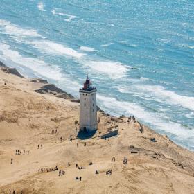 The iconic Rubjerg Knude Lighthouse moves ever closer to the sea