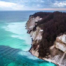 Møns Klint, a cliff in Southern Denmark, seen from above, with turquoise waters